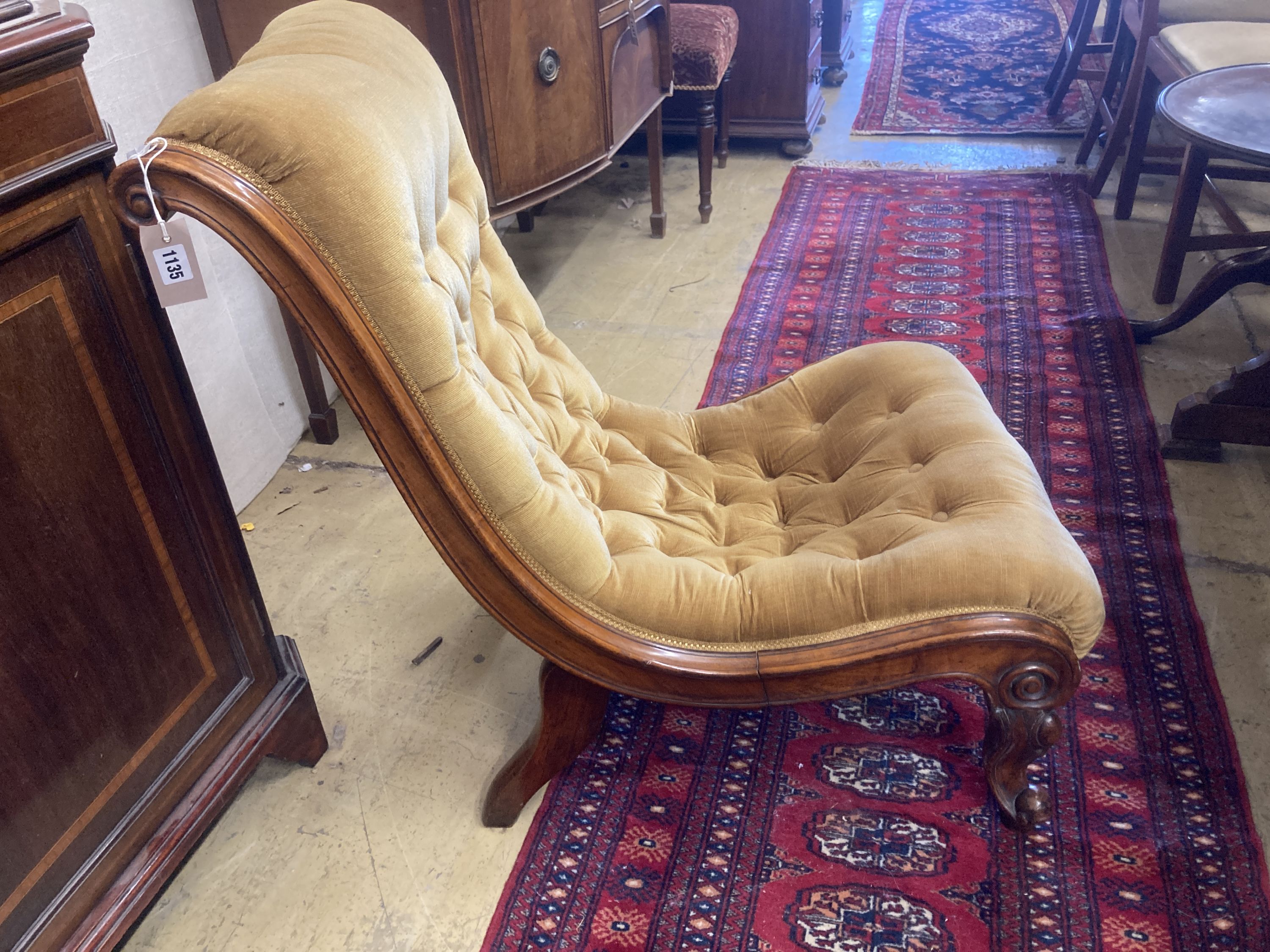 A Victorian walnut buttoned nursing chair, width 58cm, depth 80cm, height 80cm